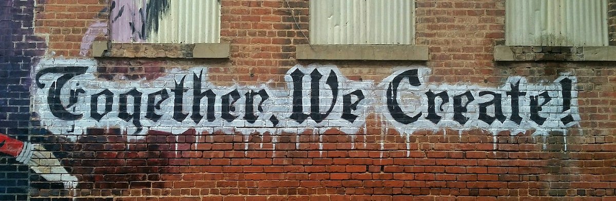 Tag sur un mur together we create